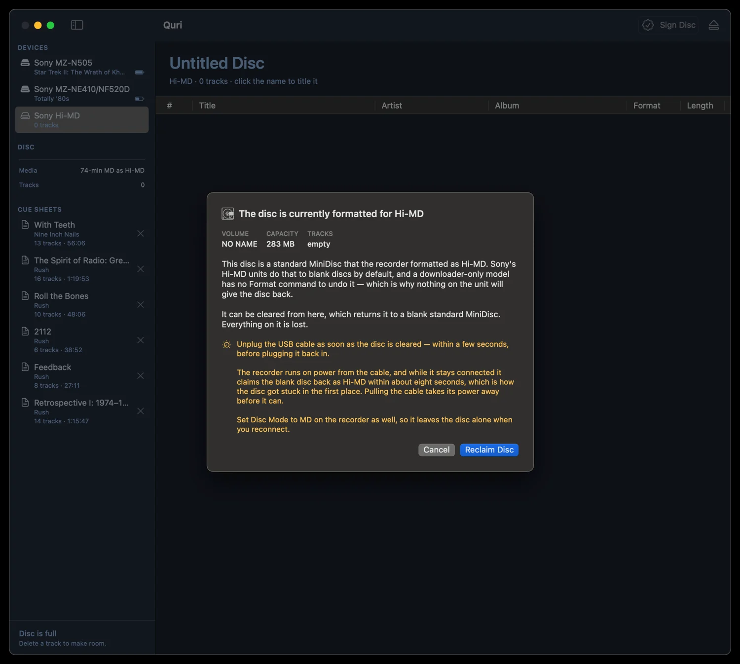 A dialog explaining that the disc is currently formatted for Hi-MD, what that means, and offering to reclaim it as a standard MiniDisc.